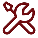 Red wrench and screwdriver icon on black.