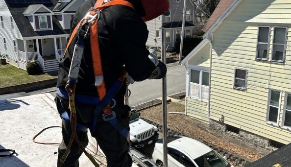 Boston fire escape pros installing a fire escape system